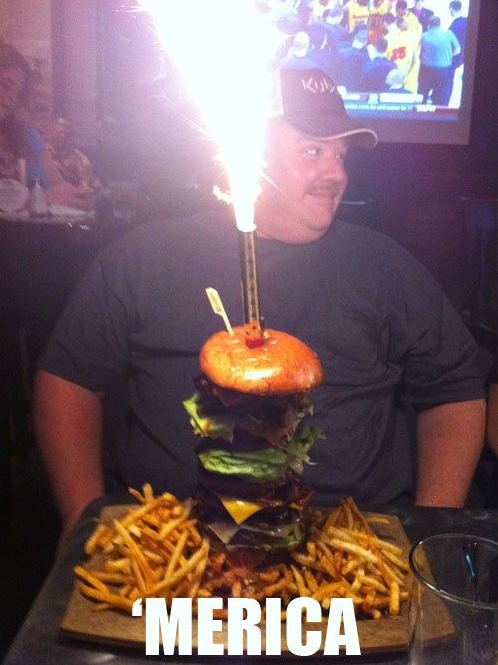 huge burger with fireworks on top