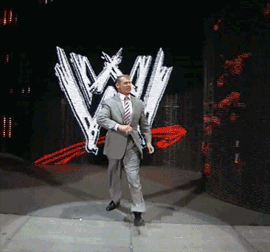 Vince Mcmahon walks in a funny way. He looks full of confidence.
